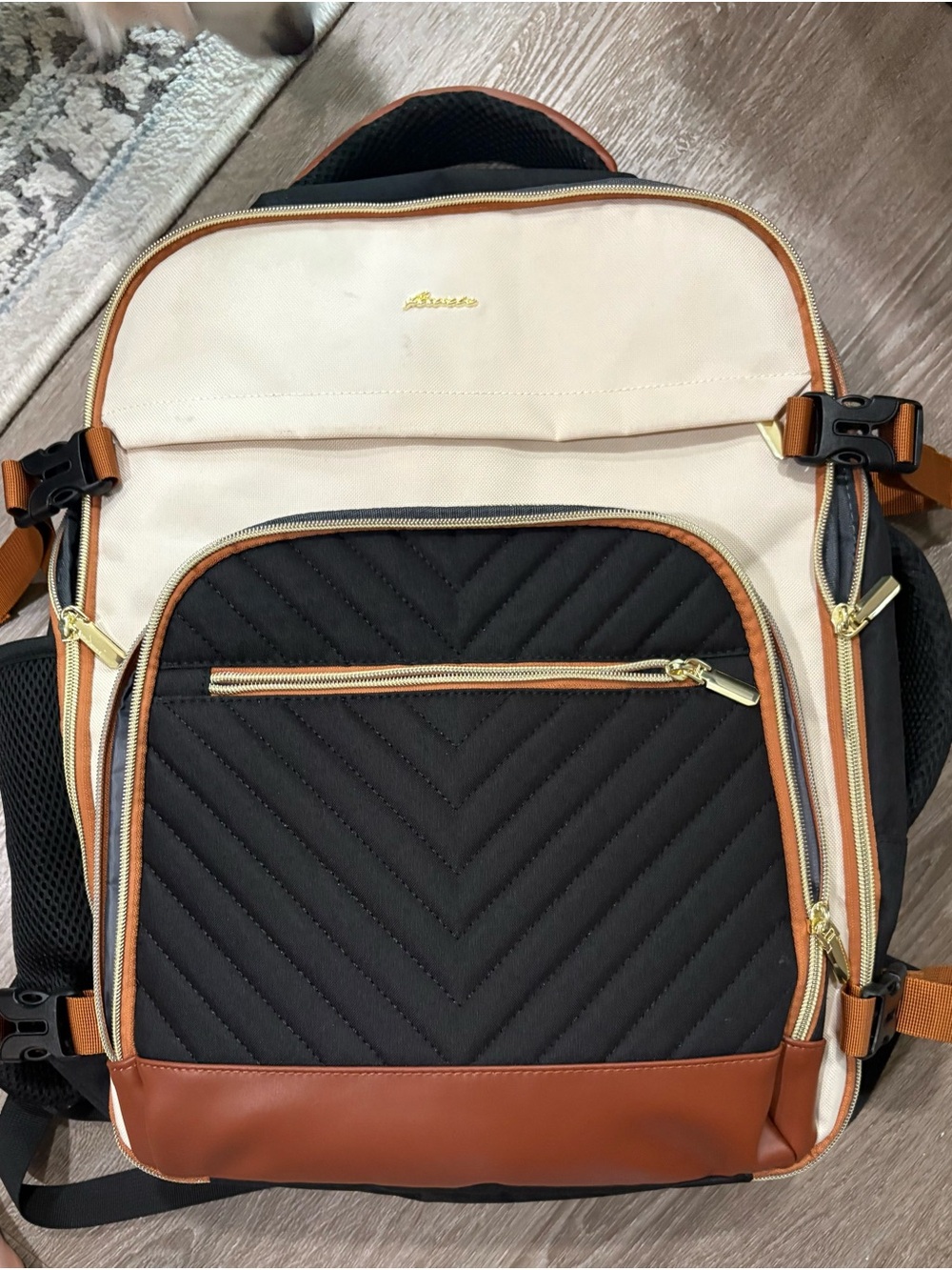 Black & Cream Quilted Backpack with Brown Trim